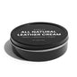 Robust Leather Conditioner bottle with applicator brush, designed to nourish and protect leather goods.