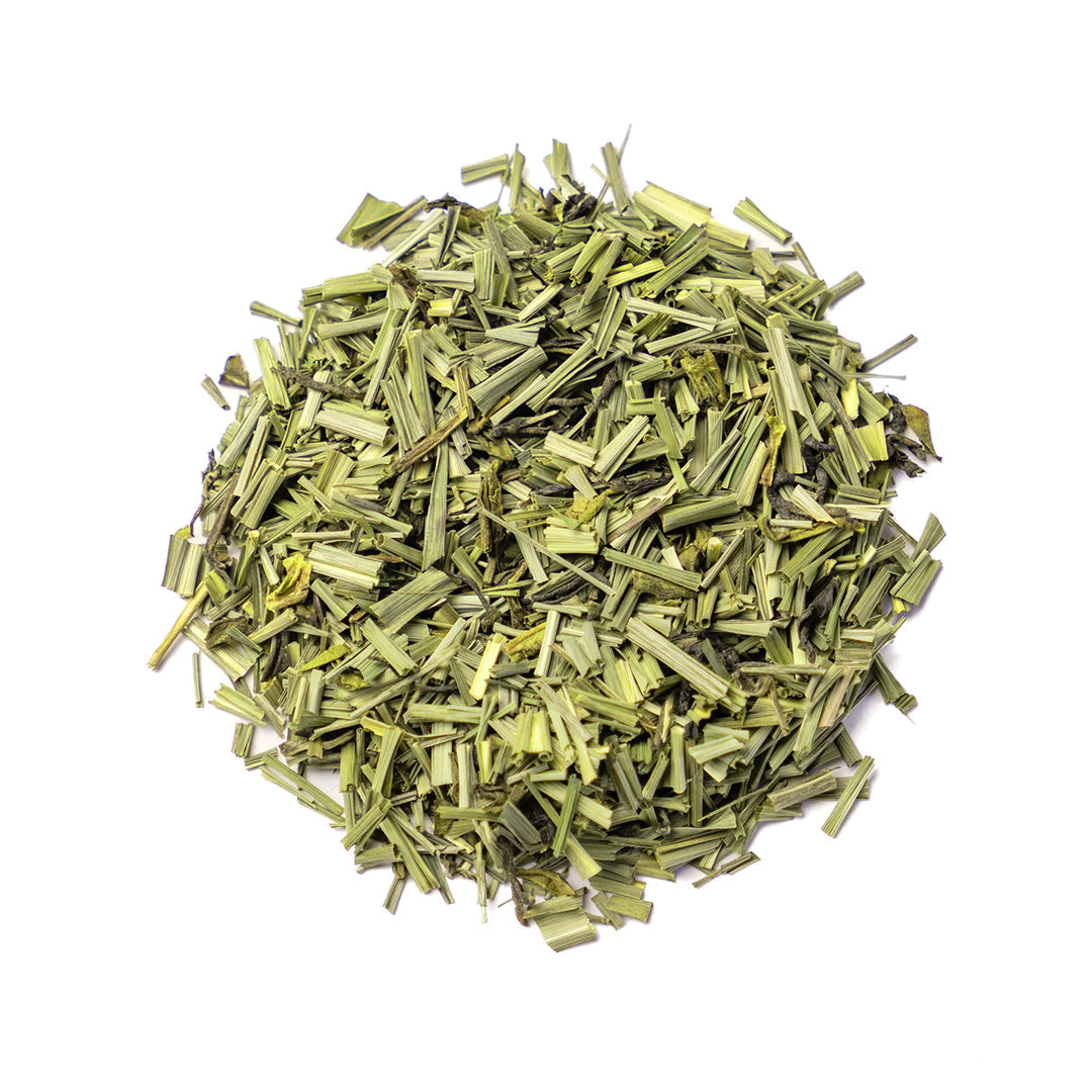 Organic Lemongrass Green Tea blend from Nepal Tea, showing fresh lemongrass and green tea leaves in a natural setting.