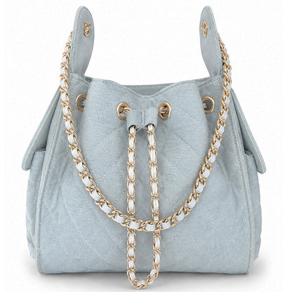 Medium Bayshore Bucket Bag by BEACH HAUS in light wash denim, showing the spacious bag with denim texture and stylish design.