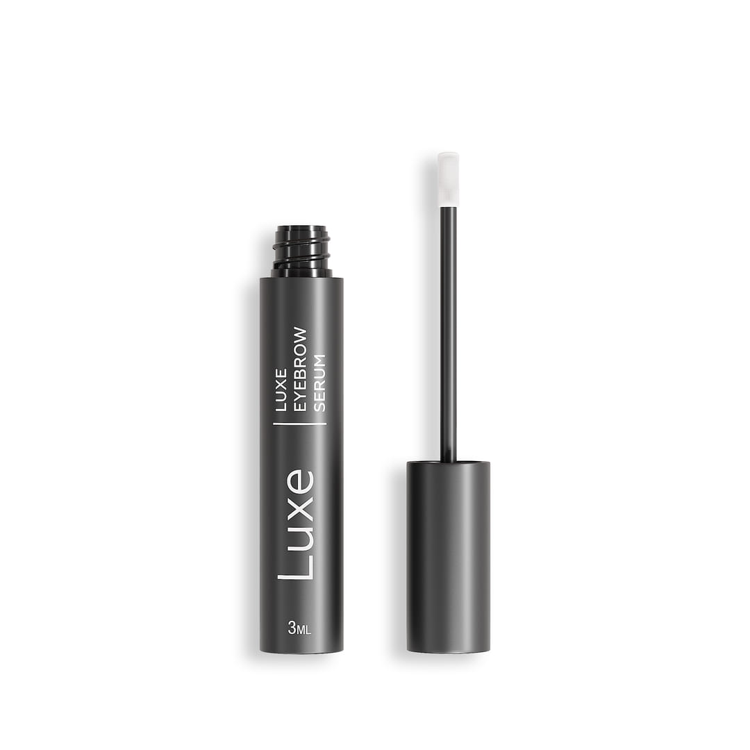 Luxe Cosmetics US Luxe Eyebrow Growth Serum bottle with applicator brush for fuller, thicker eyebrows.