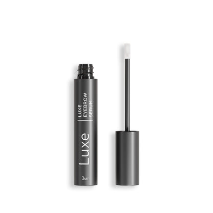 Luxe Cosmetics US Luxe Eyebrow Growth Serum bottle with applicator brush for fuller, thicker eyebrows.