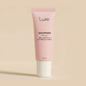 Luxe Cosmetics US Skin Perfecting Primer in a sleek tube, designed to create a smooth, flawless makeup base.