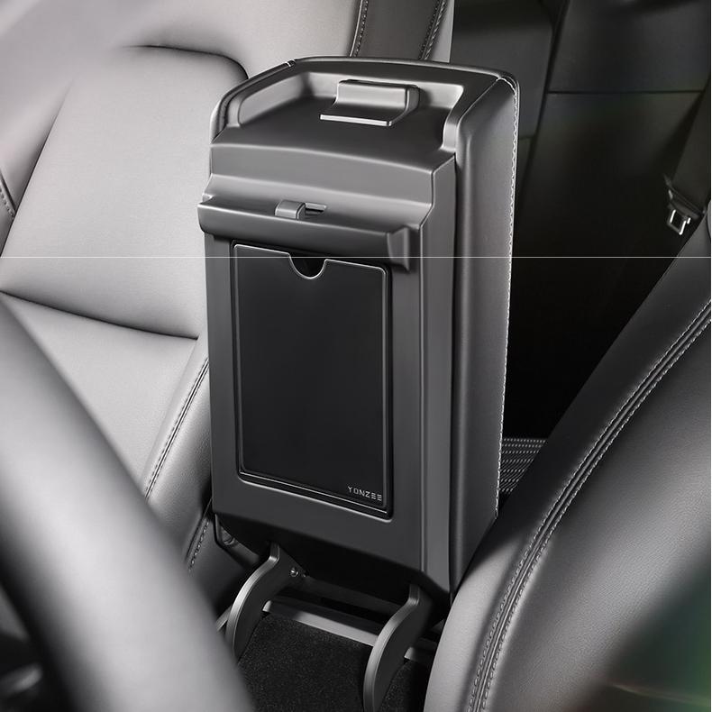 Magnetic hidden center console storage box for Tesla Model Y Juniper and Model 3 Highland, made by Tesery.