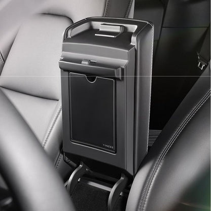 Magnetic hidden center console storage box for Tesla Model Y Juniper and Model 3 Highland, made by Tesery.