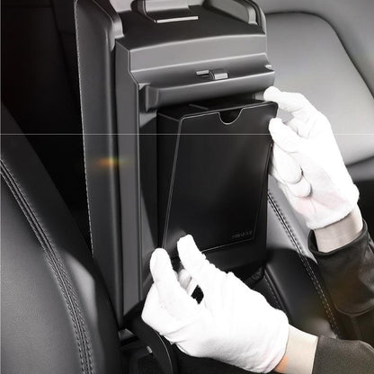 Magnetic hidden center console storage box for Tesla Model Y Juniper and Model 3 Highland, designed for organized interior storage.