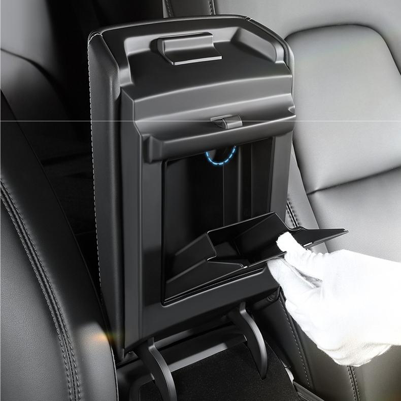 Magnetic hidden center console storage box for Tesla Model Y Juniper and Model 3 Highland, made by Tesery.