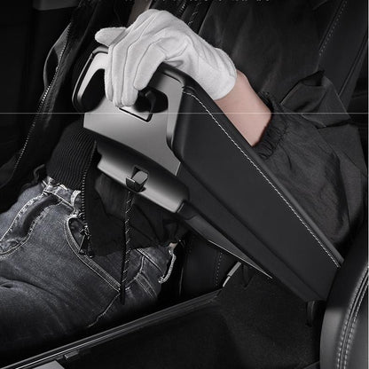 Magnetic hidden center console organizer storage box for Tesla Model Y Juniper and Model 3 Highland, keeps items tidy inside the car.