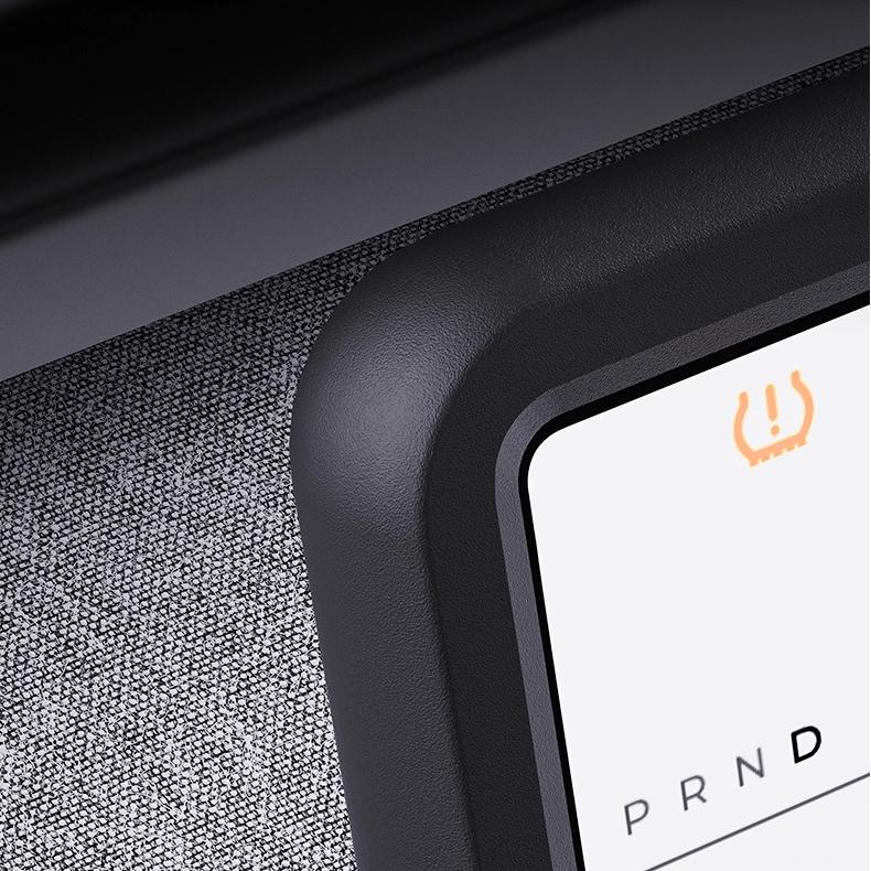 Magnetic silicone center screen frame for Tesla Model Y Juniper and Model 3 Highland, protects and enhances the dashboard display.
