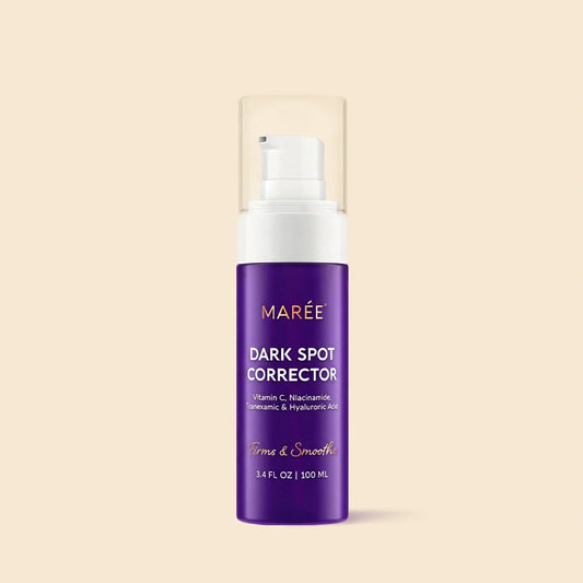 Maree Face & Body Serum for Dark Spots showing the sleek bottle and applicator on a clean surface