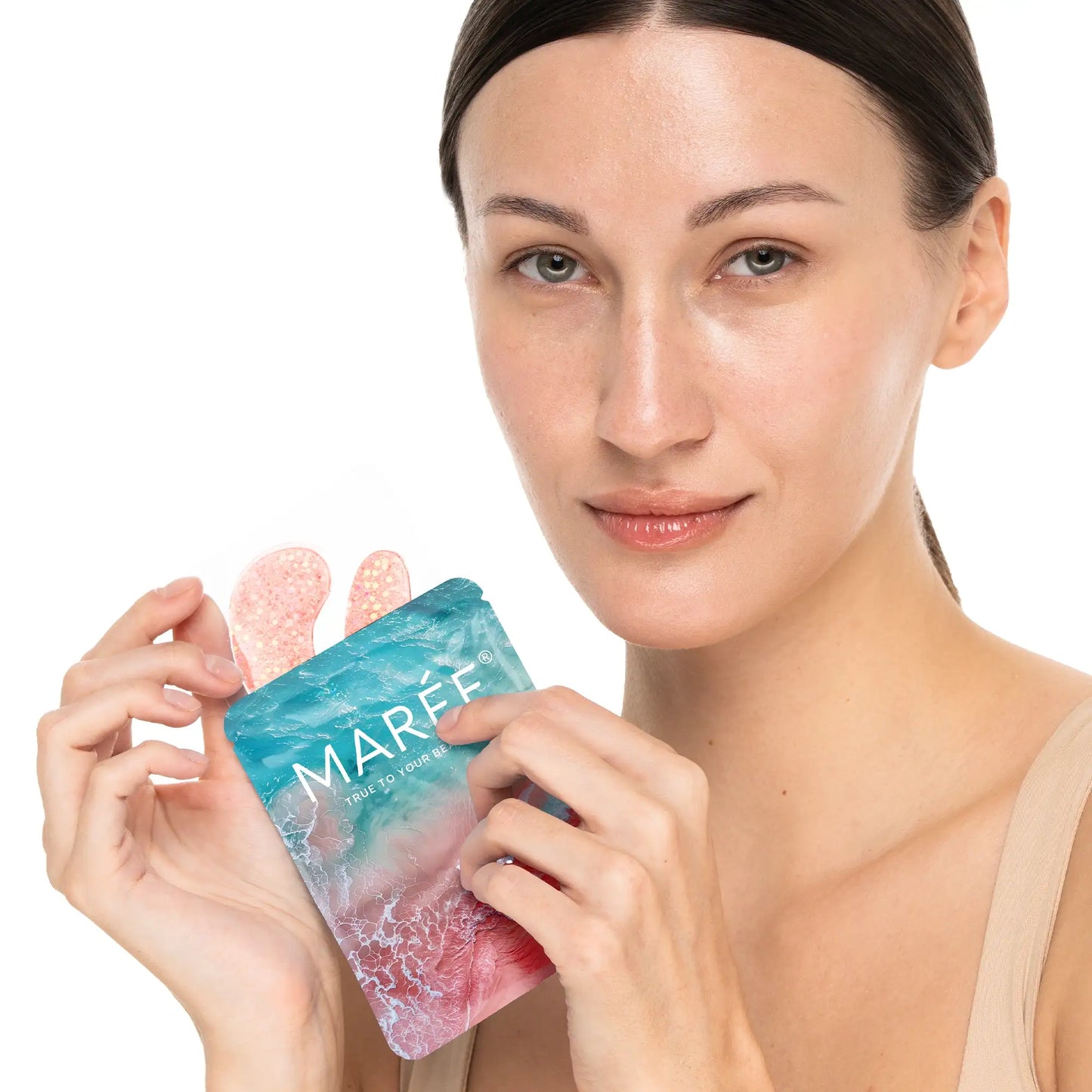 Pink eye patches by Maree designed to reduce puffiness and soothe tired eyes, shown in a close-up image of the product.