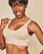Beige Meadow Wilderness front-closure cotton bralette with soft fabric and adjustable straps, shown on a plain background.