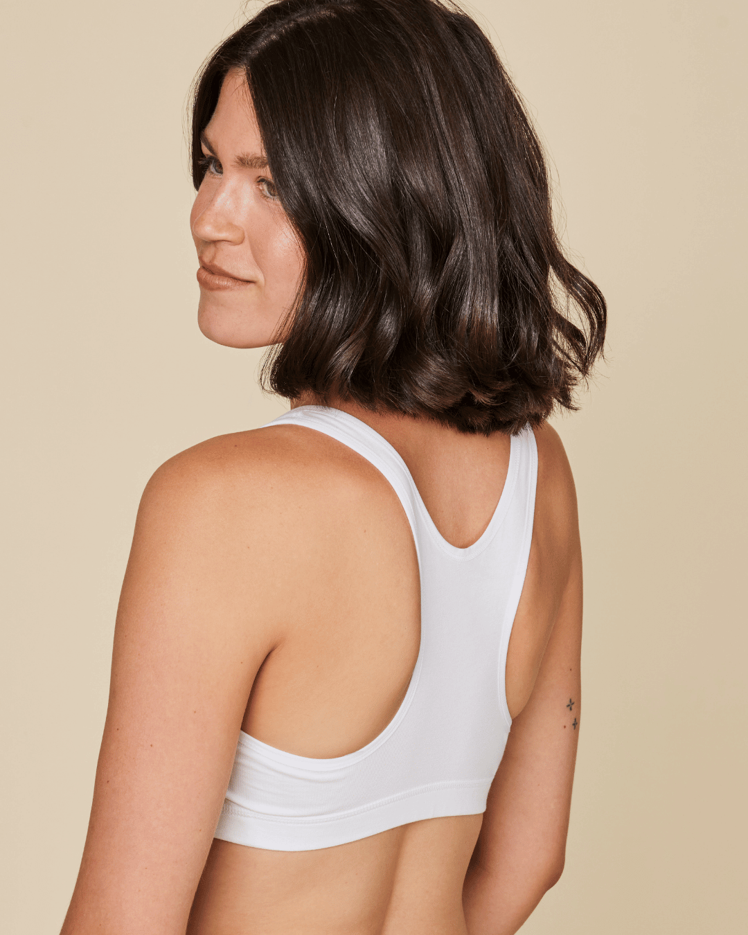 Black Meadow Glide Cotton Racerback Bralette sports bra with supportive racerback design, ideal for active wear and comfort.