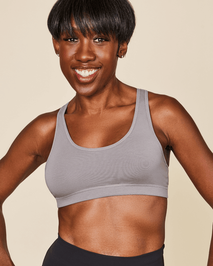 Black Meadow Glide Cotton Racerback Bralette sports bra with supportive racerback design, soft cotton fabric, small size.