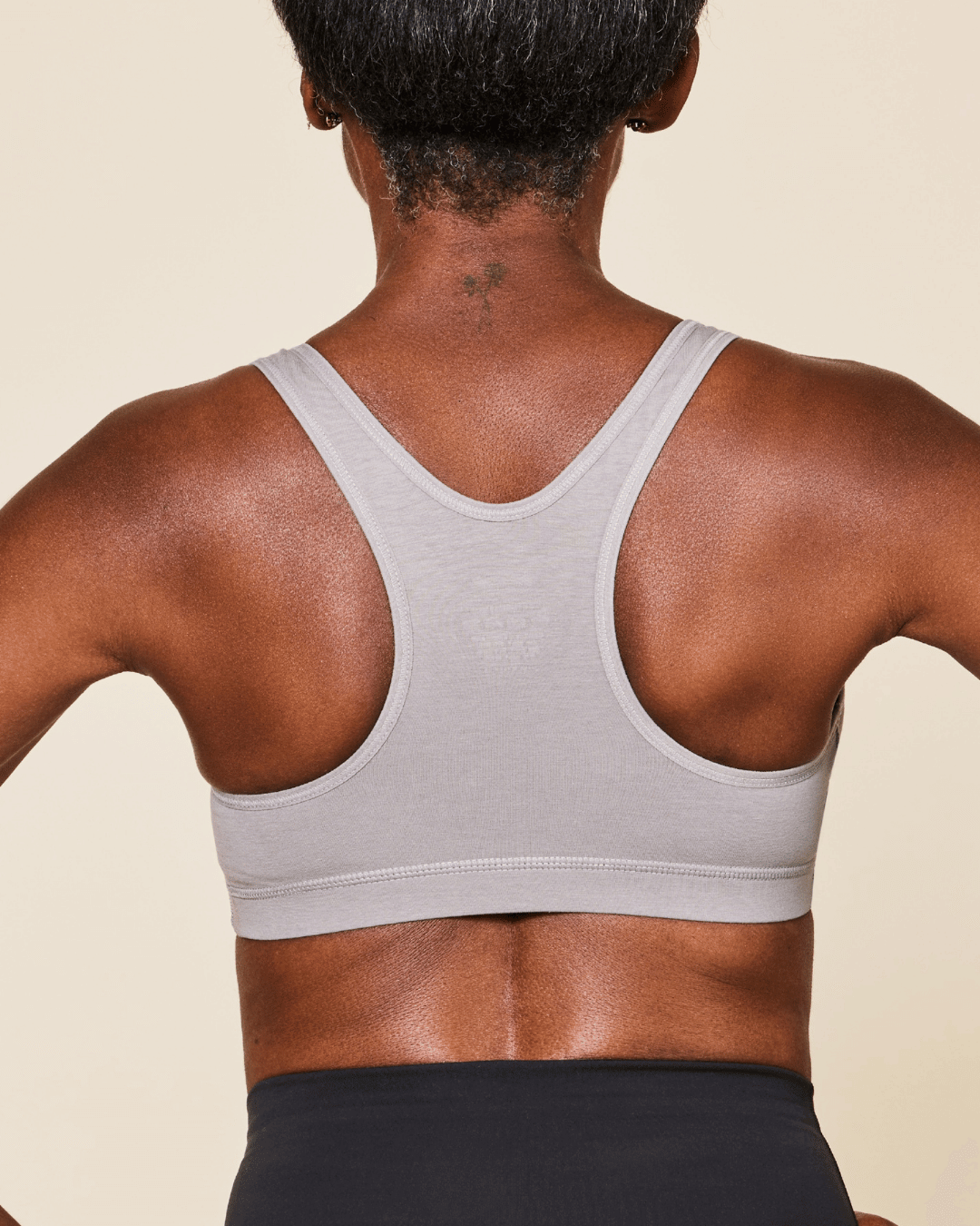 Black Meadow Glide Cotton Racerback Bralette sports bra with comfortable racerback design and soft cotton fabric.