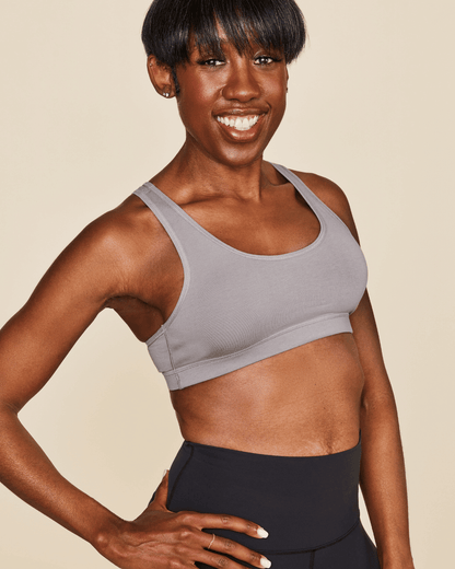 Black Meadow Glide Cotton Racerback Bralette sports bra with soft cotton fabric and supportive racerback design.