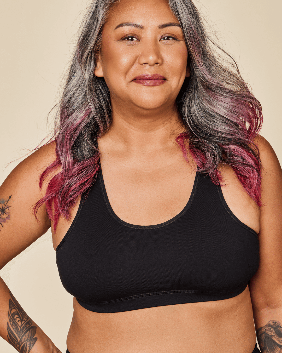 Black Meadow Glide Cotton Racerback Bralette sports bra, lightweight and comfortable for active wear, with a sleek racerback design.