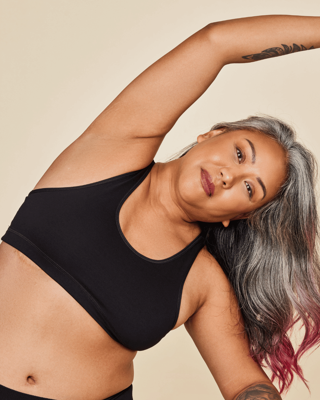 Black Meadow Glide Cotton Racerback Bralette sports bra with supportive racerback design and soft cotton fabric.