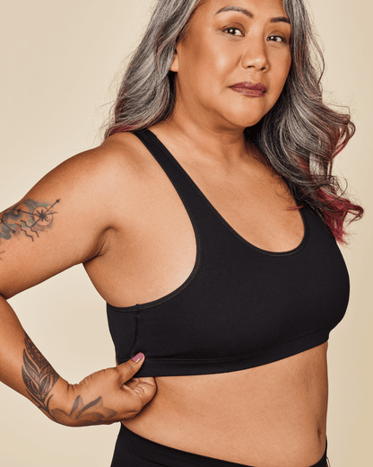 Black Meadow Glide Cotton Racerback Bralette, a comfortable sports bra with a racerback design for active wear.