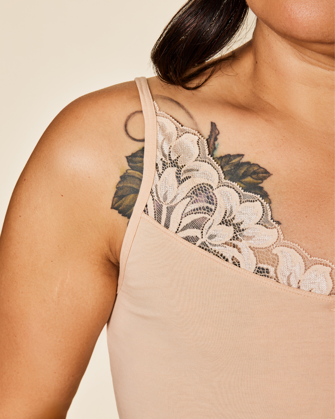 Black Meadow Luna Lace Cotton Cami sports bra with delicate lace details, designed for comfortable activewear.