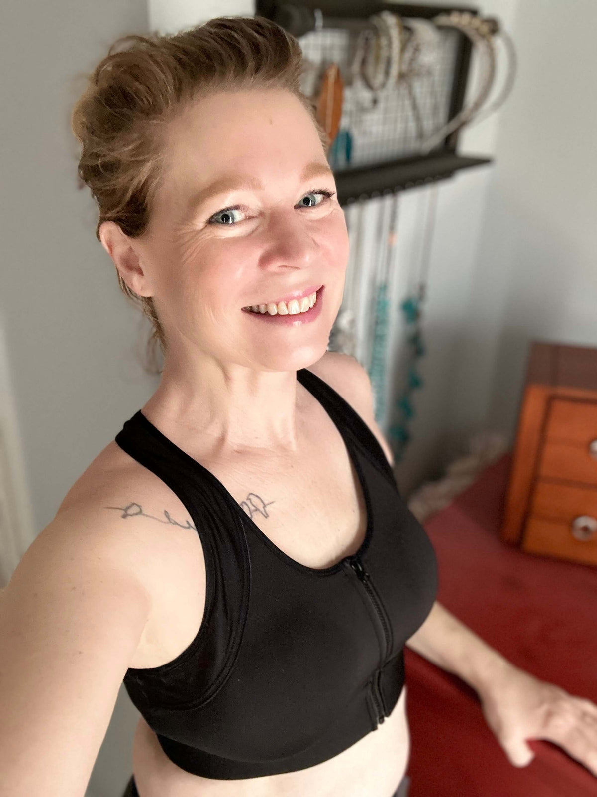 Black Meadow Hero front-closure sports bra with supportive design and adjustable straps, ideal for active wear and workouts.