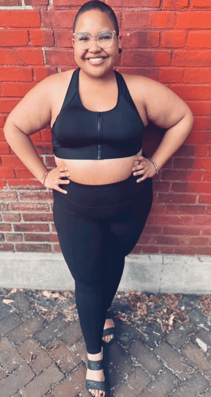 Black Meadow Hero front-closure sports bra with supportive design and adjustable straps, ideal for active wear and workouts.
