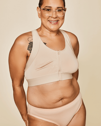 Meadow Hero front-closure sports bra in buff color, supportive athletic bra with front closure and breathable fabric.