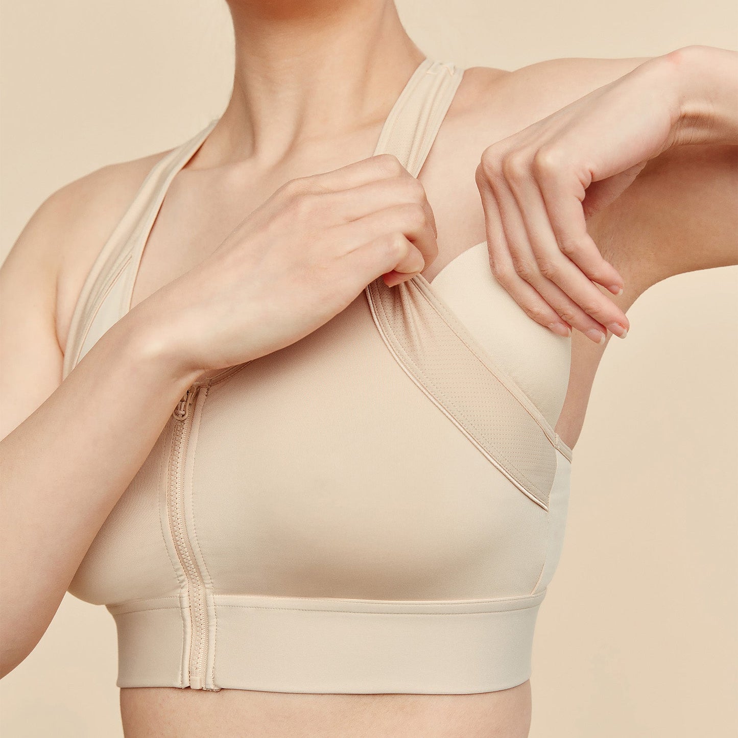 Meadow Hero front-closure sports bra in buff color, supportive athletic bra with front closure and breathable fabric.