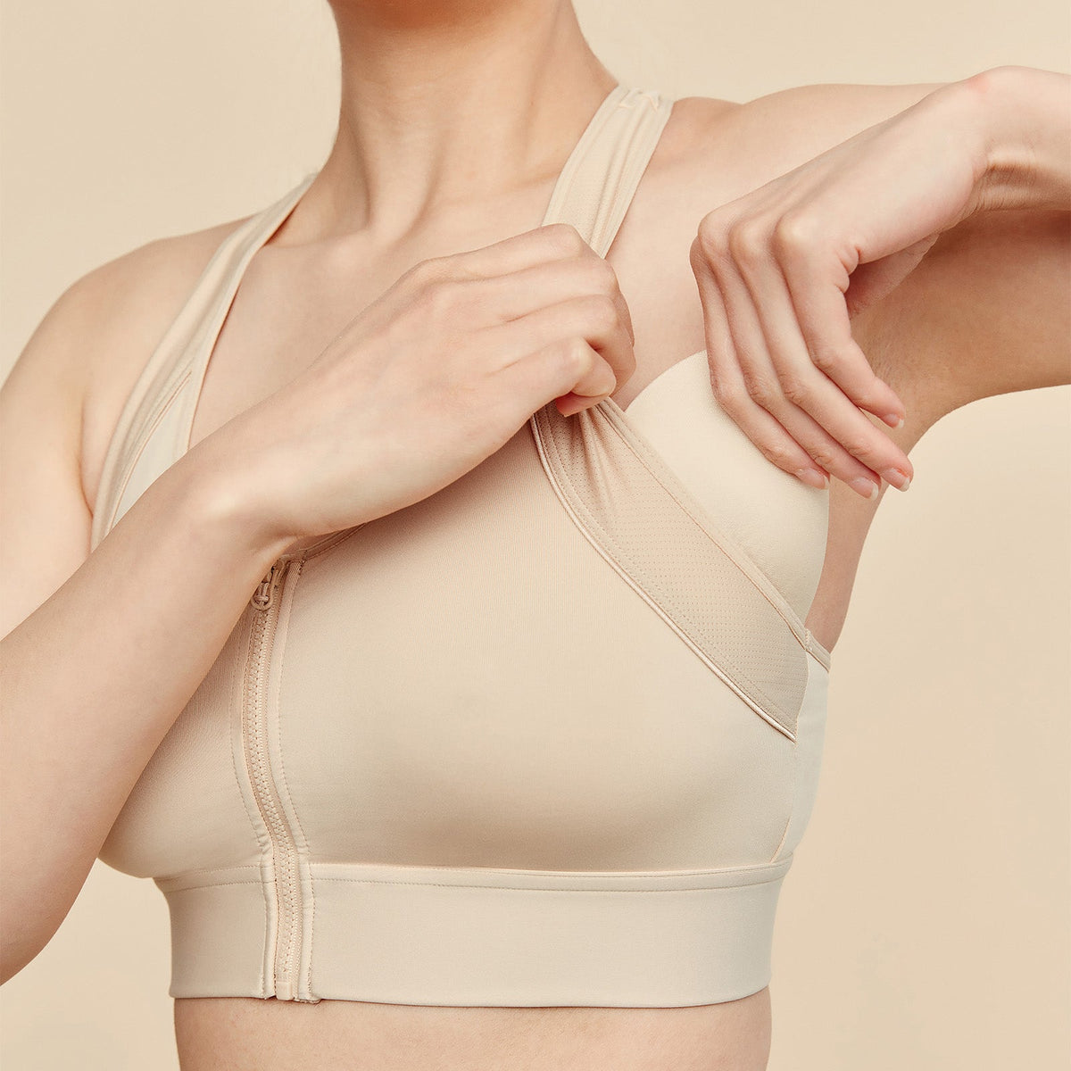 Meadow Hero front-closure sports bra in buff color, supportive athletic bra with front closure and breathable fabric.
