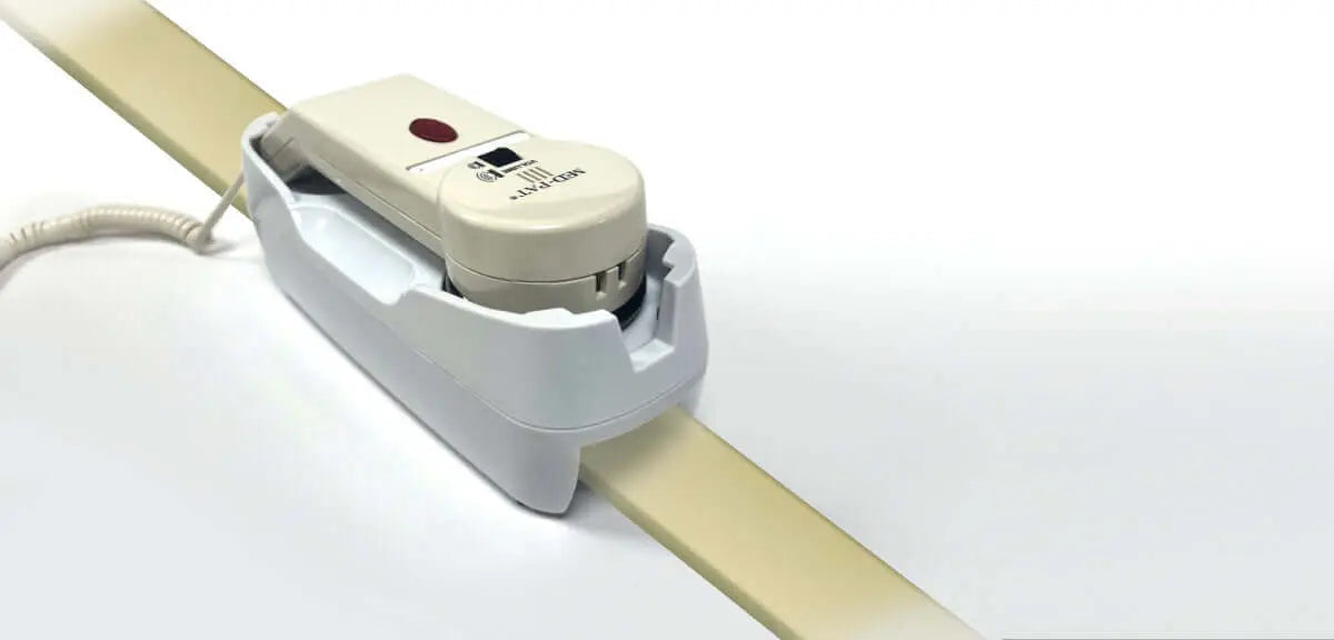 Med-Pat HO-100 adjustable bedrail phone holder clip securing one-piece phones on hospital beds for easy access and safety.