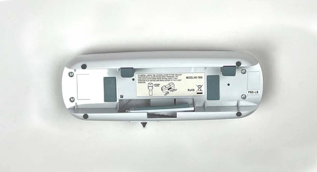 Med-Pat HO-100 adjustable bedrail phone holder clip securely attaches to hospital bed rails for one-piece phones.