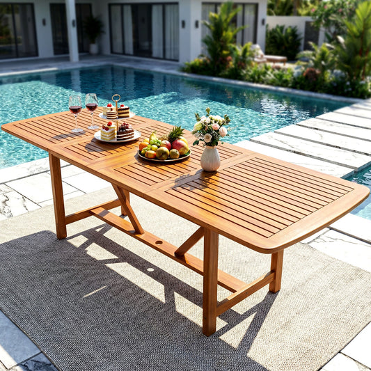 Extendable outdoor dining table by Megsu, showing a spacious wooden table with extendable leaves for flexible seating.