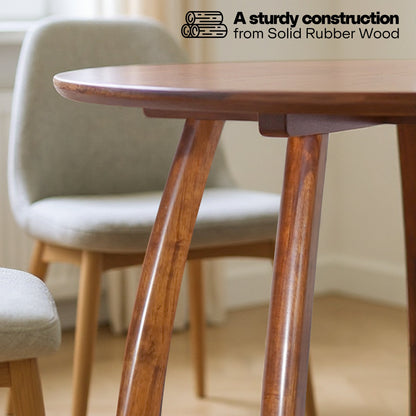 Natural wood Alma 36-inch round dining table by Megsu, showcasing smooth surface and sturdy legs for family meals.