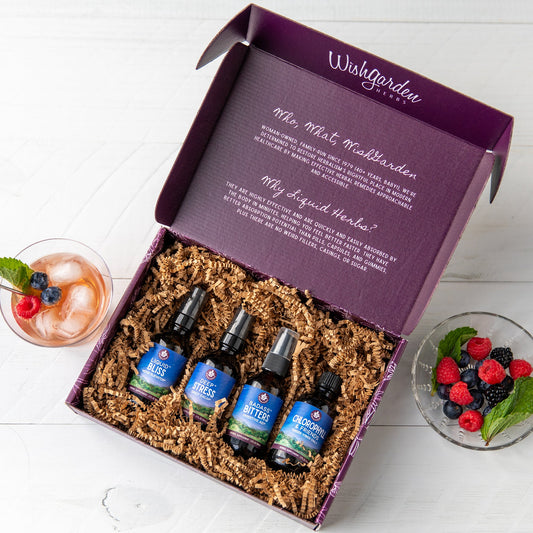 WishGarden Herbs mocktail essentials kit with gift box, featuring bottles, mixers, and garnishes for crafting adult non-alcoholic drinks.