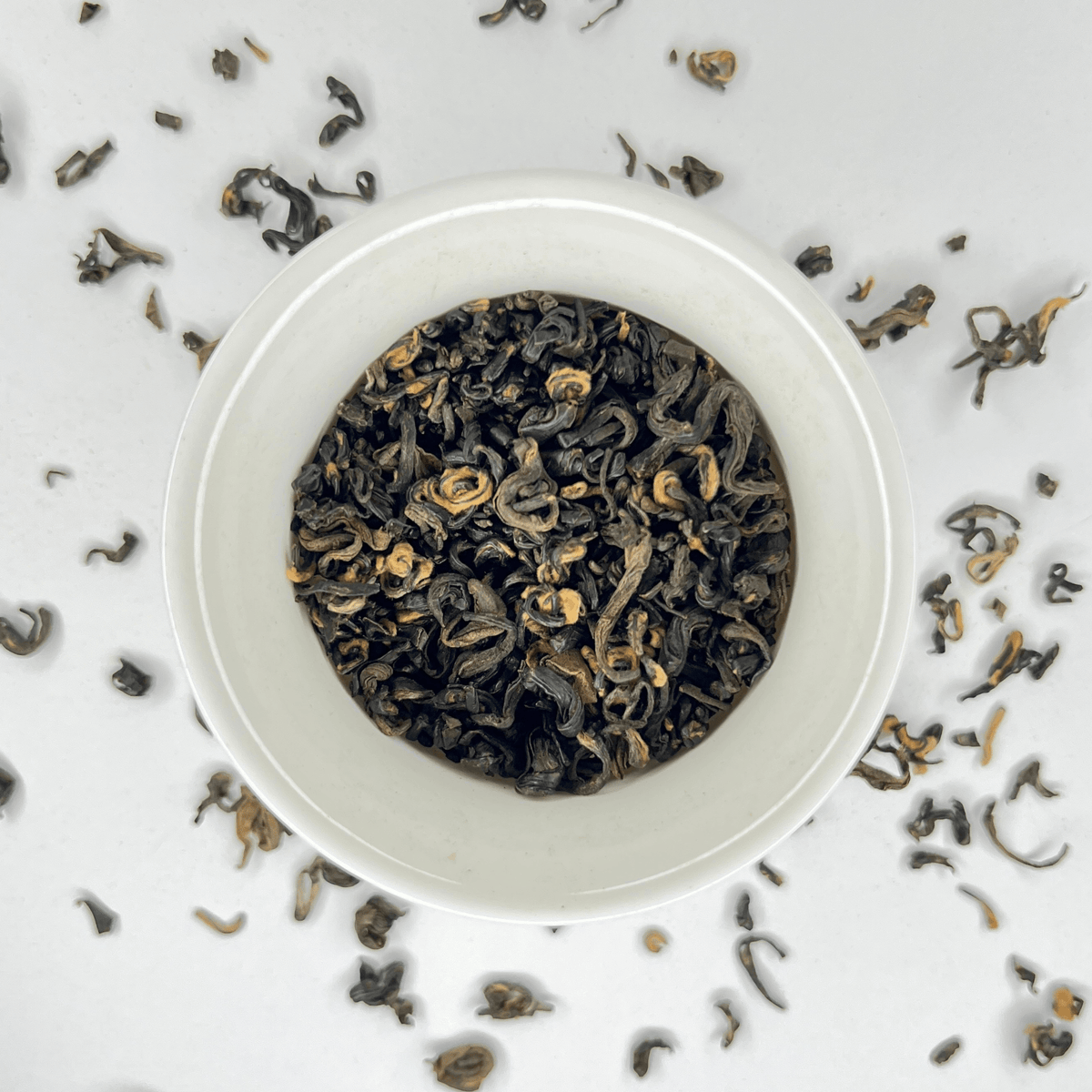 Nepal Tea Everest Black tea in a cup, showcasing dark, rich brewed tea with a deep amber color, ideal for black tea lovers.
