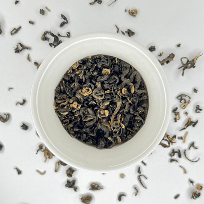 Nepal Tea Everest Black tea in a cup, showcasing dark, rich brewed tea with a deep amber color, ideal for black tea lovers.