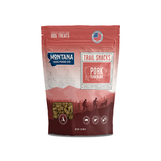 Freeze-dried pork tenderloin dog treats by Montana Dog Food Co in a 3oz package, showing crunchy, natural dog snack pieces.