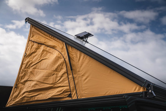 Starlink Mini "Always On" dual action mount by Super Pacific, shown on a vehicle's driver side for secure satellite dish attachment.