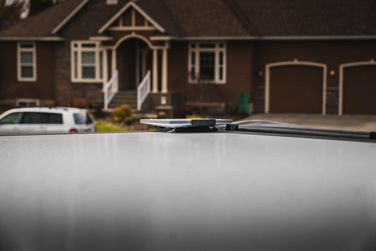 Starlink Mini "Always On" dual action mount by Super Pacific installed on a vehicle's driver side for secure satellite dish positioning