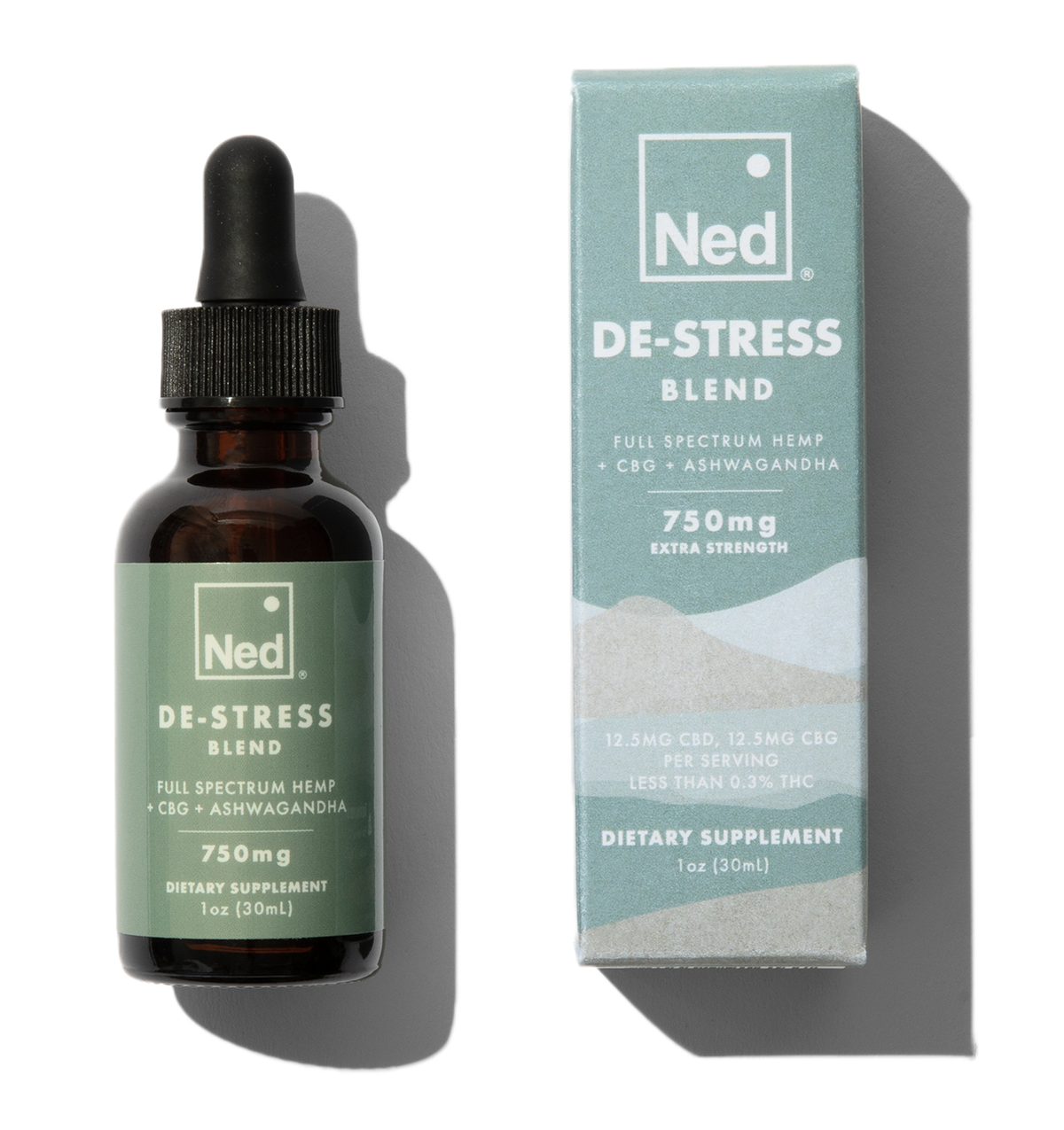 Foria De-Stress Blend oil tincture bottle with dropper, featuring calming herbal ingredients in a natural setting.
