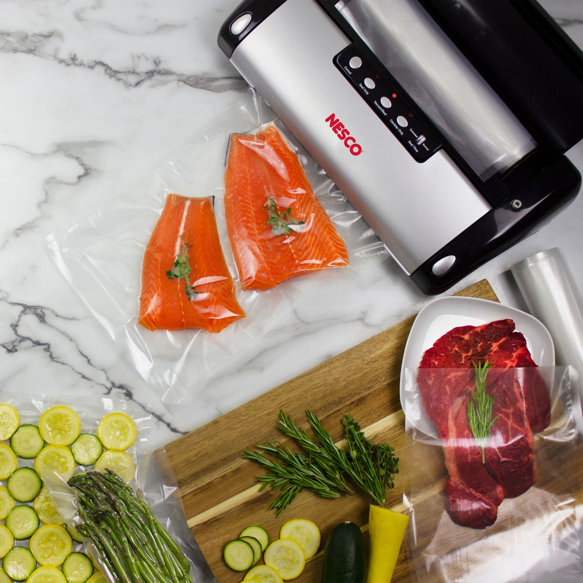 NESCO vacuum sealer machine with built-in roll storage, accessory port, and two 10 ft rolls for food preservation and pantry storage.