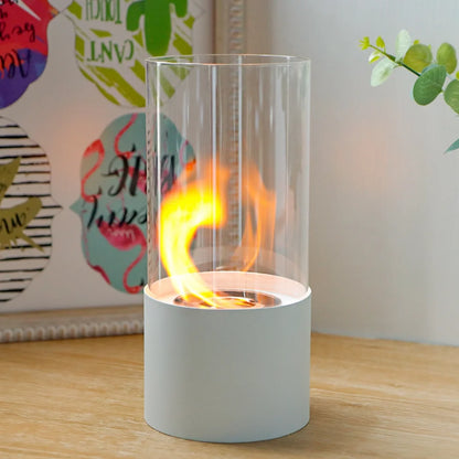 JHY DESIGN portable tabletop firepit with cylindrical design, glass enclosure, suitable for gel and ethanol flames.