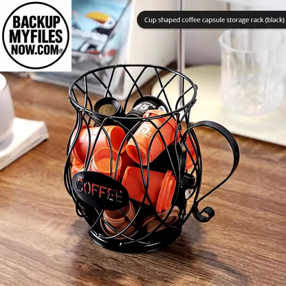 Black coffee pod holder in mug shape, large capacity organizer for coffee pods and creamer containers, ideal for coffee storage.