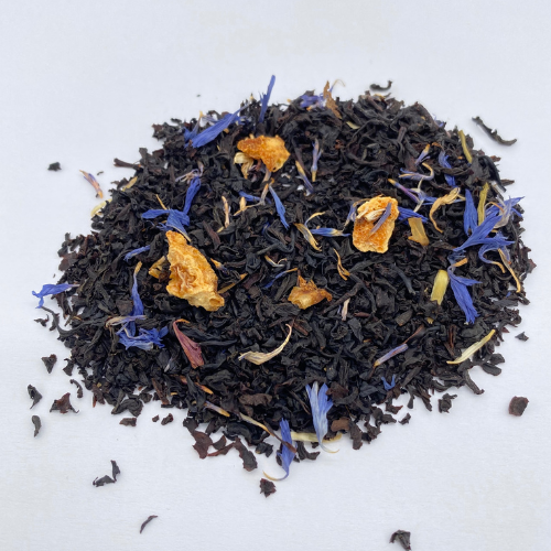 Loose leaf Earl Grey Moonlight black tea in a jar, with tea leaves visible, from Novel Tea Book Shop.