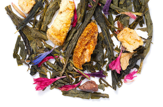 Loose leaf Cranberry Nut Muffin Tea by Novel Tea Book Shop, showing colorful dried fruit and nut blend in a clear tin.
