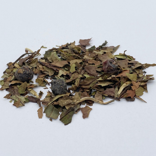 White Blueberry loose leaf white tea by Novel Tea Book Shop, showcasing fresh blueberry-infused white tea leaves.