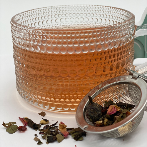 White Eternal Spring loose leaf white tea from Novel Tea Book Shop, showcasing delicate white tea leaves.