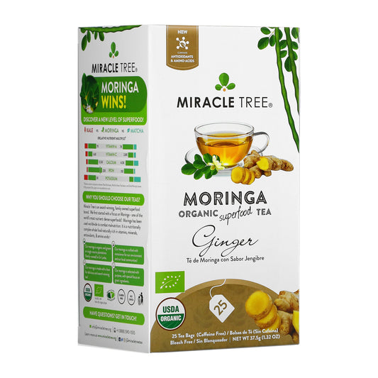 Organic Moringa Ginger Herbal Tea by Miracle Tree, caffeine-free herbal tea in a teapot with fresh ginger and moringa leaves.
