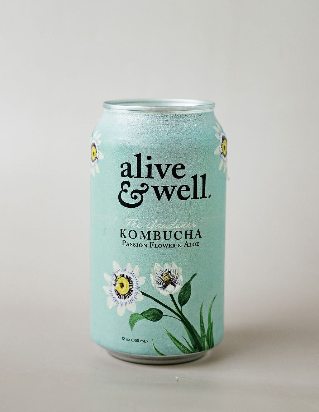 Organic Oak & Coconut Kombucha by Alive & Well in a can, featuring a refreshing beverage with natural ingredients and a tropical flavor.