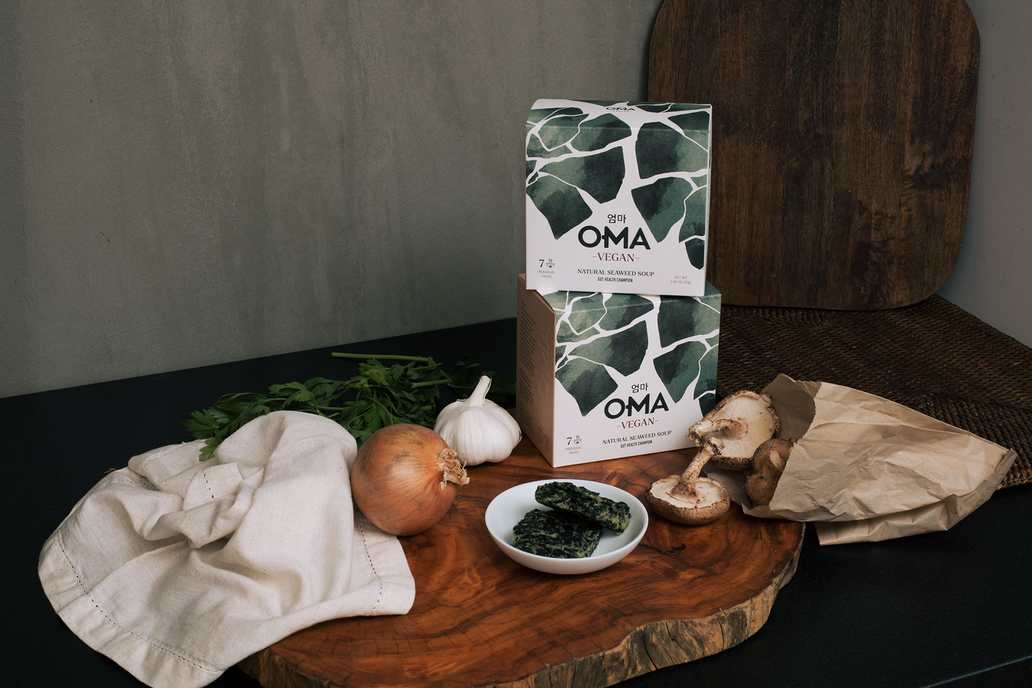 Box of OMA Natural Food Nourishing Seaweed Soup Vegan Broth, featuring seaweed ingredients and healthy, plant-based broth in packaging.