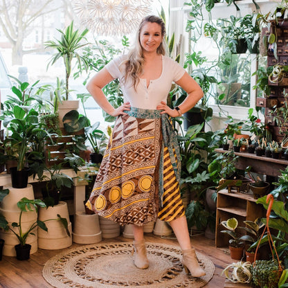 Boho plus-size sari wrap skirt made with eco-friendly yarn by Darn Good Yarn, featuring colorful crochet and knit details.